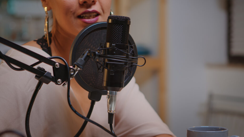 Close up talking on microphone